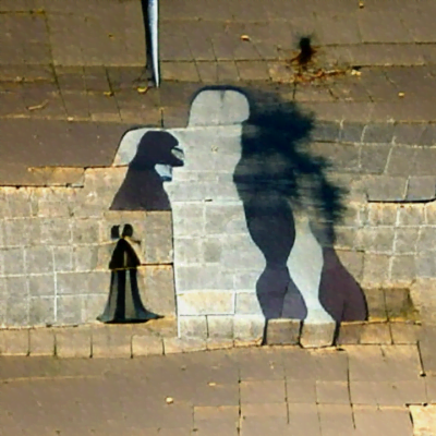 A man with a woman's shadow