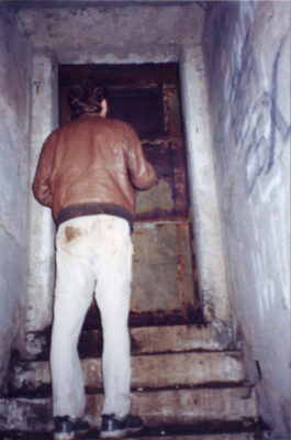 At one end of a long hallway, this sealed door led to the outside world.