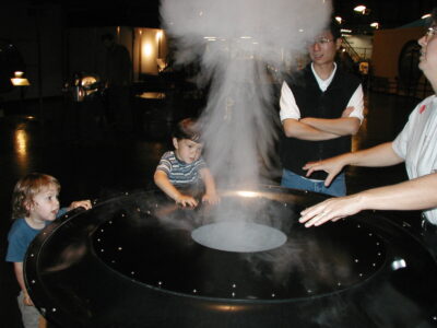 More details Visitors collaborate to make a smoke ring at the Exploratorium's previous location at the Palace of Fine Arts